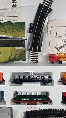 En français, cela se traduirait par : Ensemble de train électrique modèle HO Scale complet de 1989 TYCO vintage Railroad Empire II.