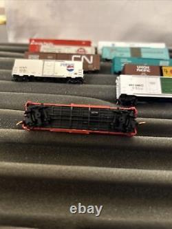 Lot de 10 wagons de marchandises pour train miniature à l'échelle N. Libby's, Pepsi Cola, etc.